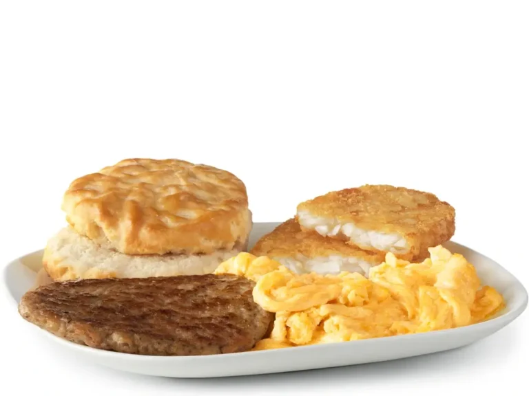 The Big Breakfast® includes scrambled eggs, a savory sausage patty, hash browns, and a soft biscuit.