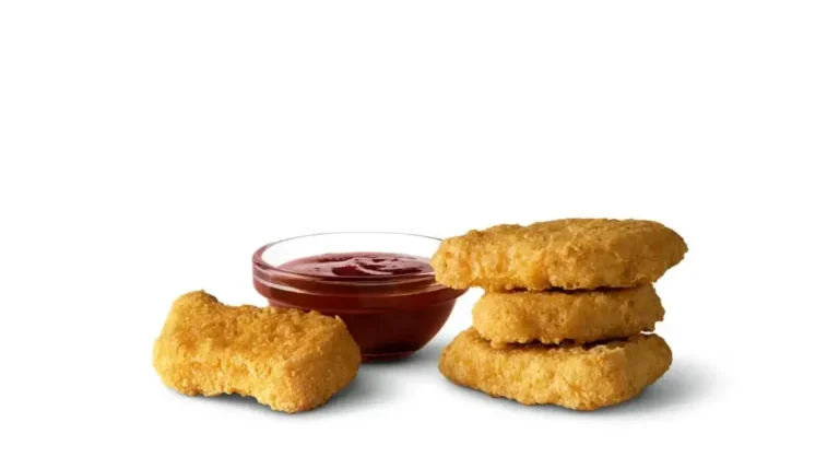 A box of crispy Chicken McNuggets® made from all-white meat, perfect for dipping.