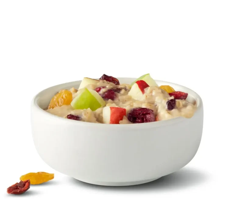 A warm oatmeal made with diced apples, cranberries, and two kinds of raisins for a wholesome breakfast.