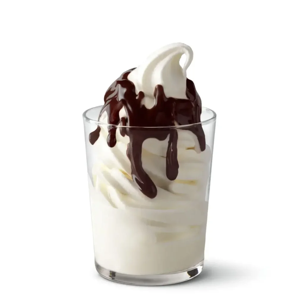 A McDonald's Hot Fudge Sundae with creamy vanilla soft-serve topped with rich, warm fudge sauce.