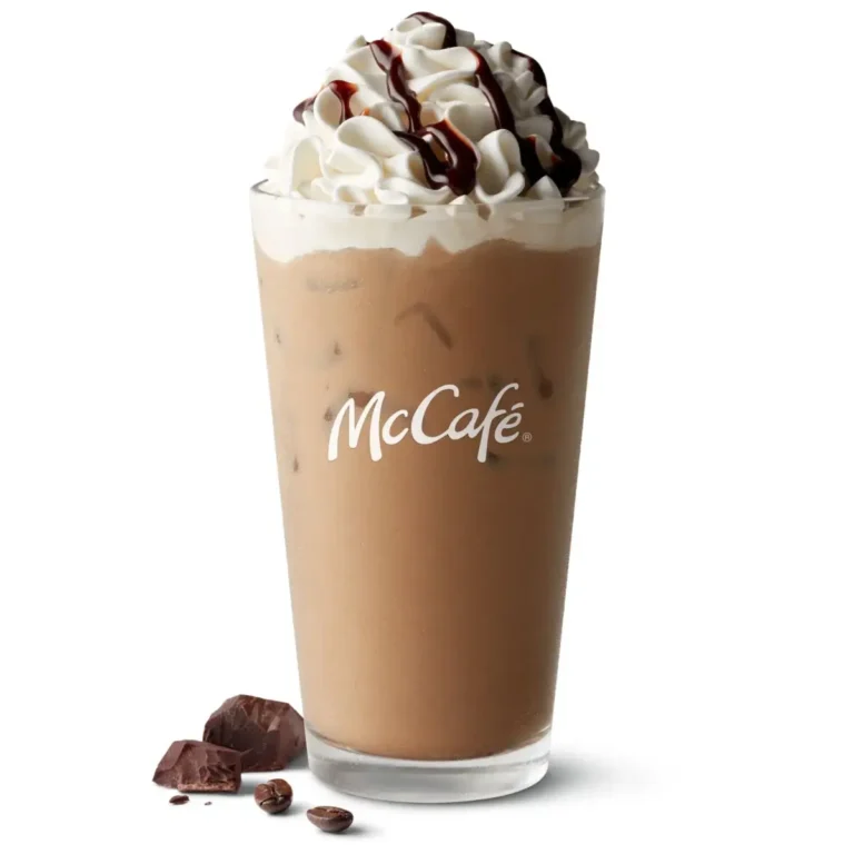 A refreshing McCafé® Iced Mocha Latte made with espresso, milk, and chocolate syrup, served over ice.