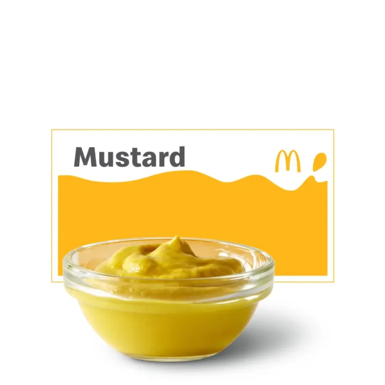 A packet of McDonald's mustard, adding a tangy and bold flavor to your meal.